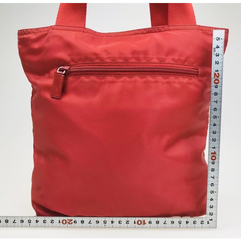 Prada nylon shoulder bag in red color