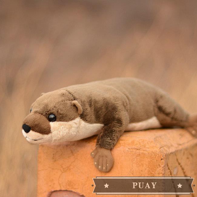 otter plush pillow