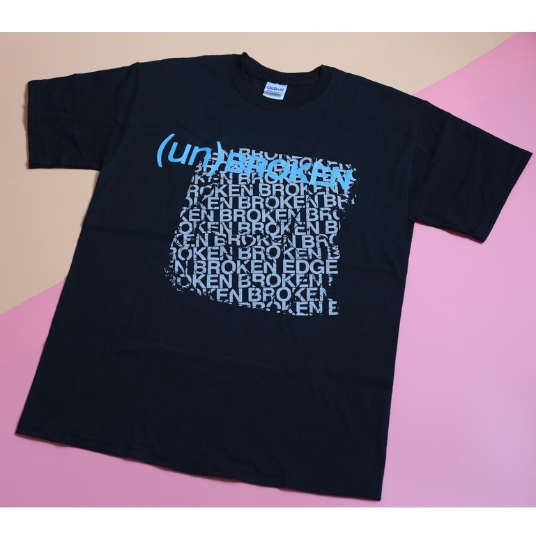 เสื้อสกรีนตัวอักษร UNBROKEN