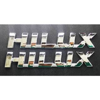 logo HILUX ติดข้างรถ ซ้าย - ขวา 2 ชิ้น HILUX REVO รีโว้ โตโยต้า Size: 3.8*22 CM รับประกัน 6 เดือน ไม่ลอกไม่ดำ
