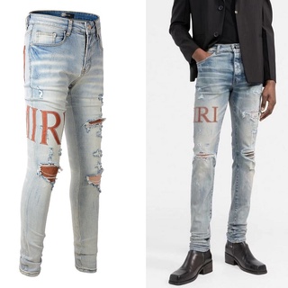 AMIRI letter LOGO patch leather slim light color jeans