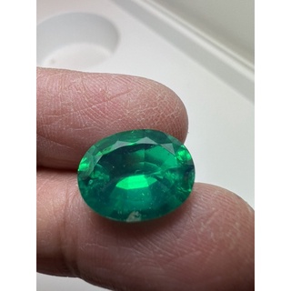 Green oval 9 x 11mm Lab made gemstone