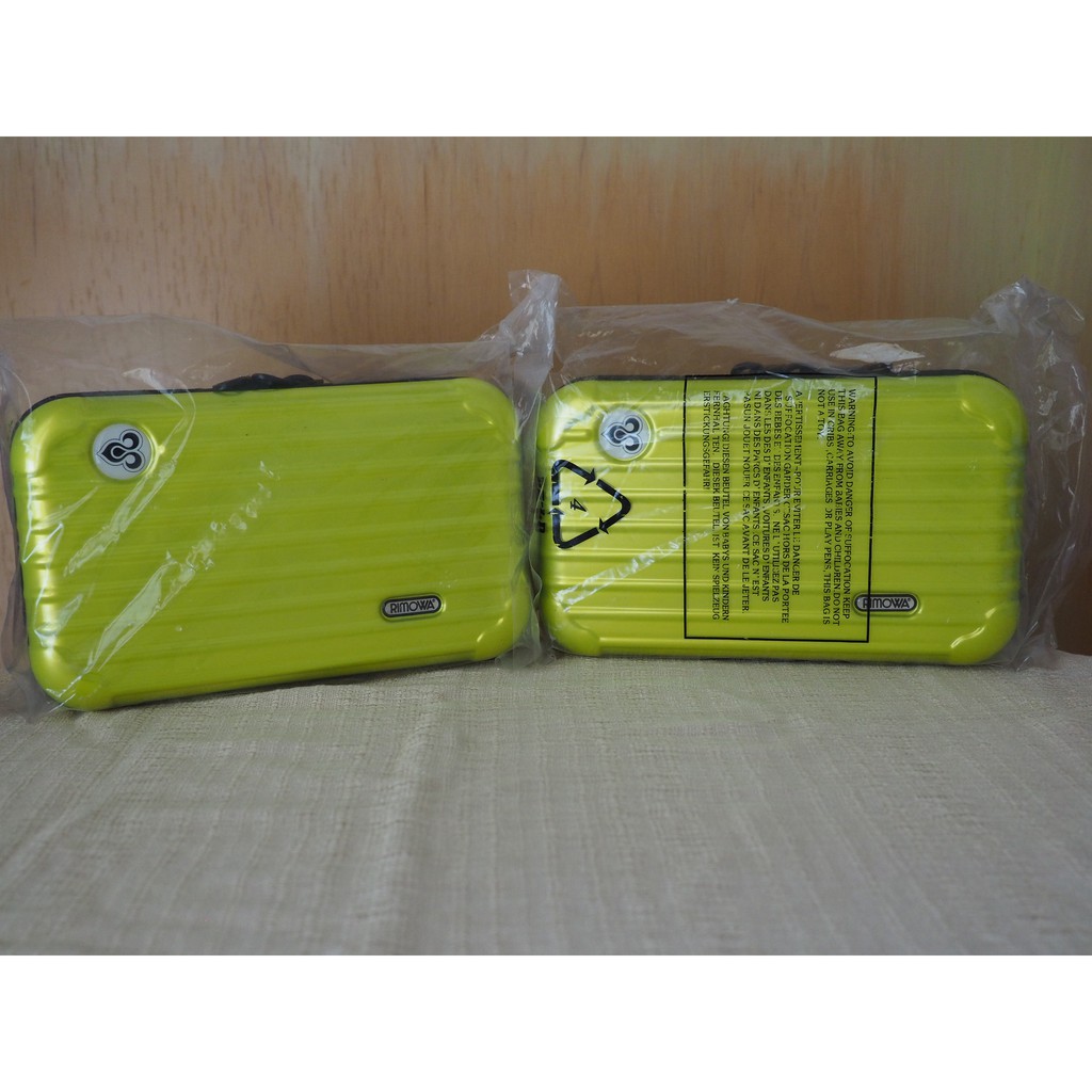 กระเป๋า Amenity Kit ของ Rimowa Thai Airways First Class สีเหลืองมะนาว