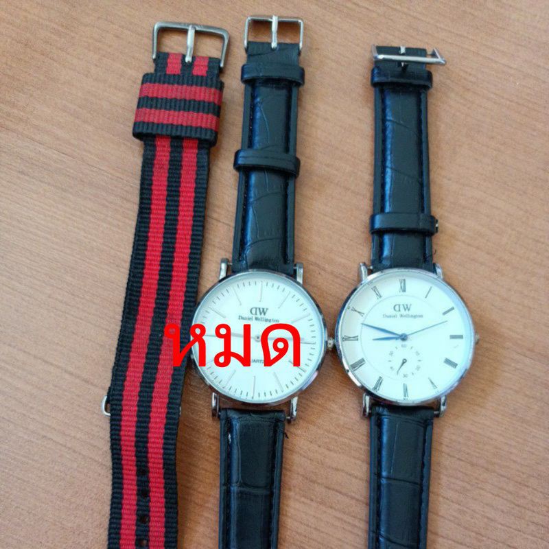 นาฬิกาแบรนด์เนมDW Daniel Wellingtonหน้าปัดสีขาว ตัวเรือนสีเงินสายหนังสีดำของแท้มือสองสภาพสวย