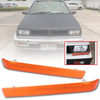 ใต้ไฟหน้า MITSUBISHI แชมป์ ไฟเลี้ยว CHAMP ปี 1992 - 1994 สีส้ม 1 คู่