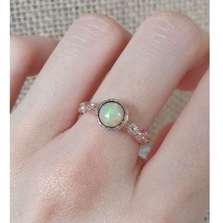 Opal 6 mm. with White Topaz