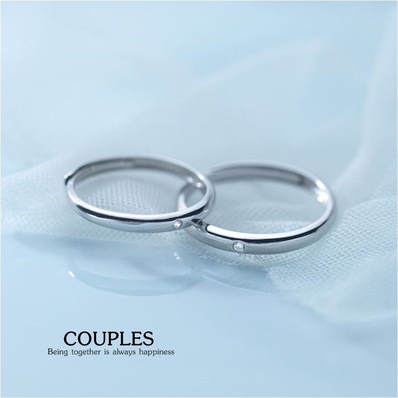 แหวนคู่รักเงินแท้ 92.5% Cheerful couples RGC-020 แบบผิวเกลี้ยงฝังเพชร CZ ปรับขนาดได้