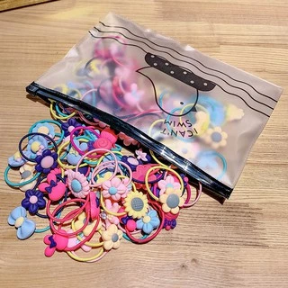 ยางรัดผมเด็ก 30 กว่าแบบ เส้นเล็ก ใหญ่ ยางสีดำ ยางสี พร้อมถุงซิป
