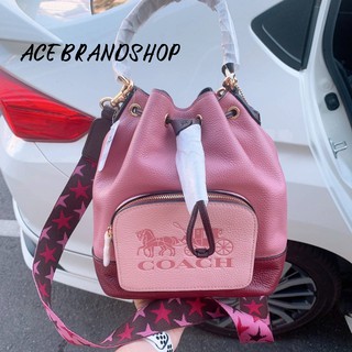 JES DRAWSTRING BUCKET BAG IN COLORBLOCK WITH HORSE AND CARRIAGE (COACH 1899)