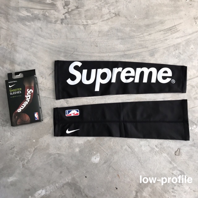 black supreme shooting sleeve