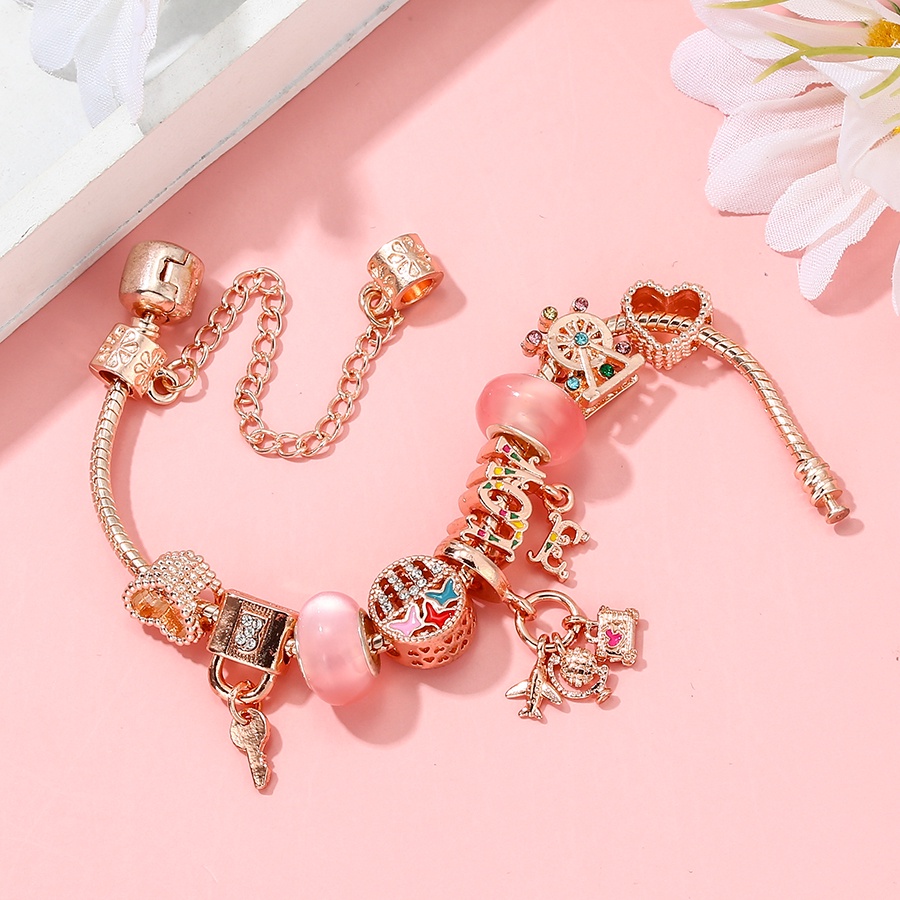 Dinglly โรสโกลด์ เครื่องบิน และกระเป๋าเดินทาง จี้ผีเสื้อ รัก ลูกปัด หัวใจ ล็อค & พวงกุญแจ จี้ สร้อยข้อมือ สําหรับผู้หญิง กําไลข้อมือคริสตัล สีชมพู
