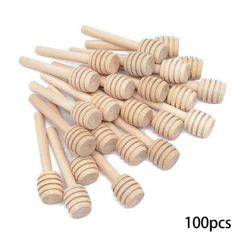 Premium Photo | Two Wooden Honey Spoons Isolated On White - View #2