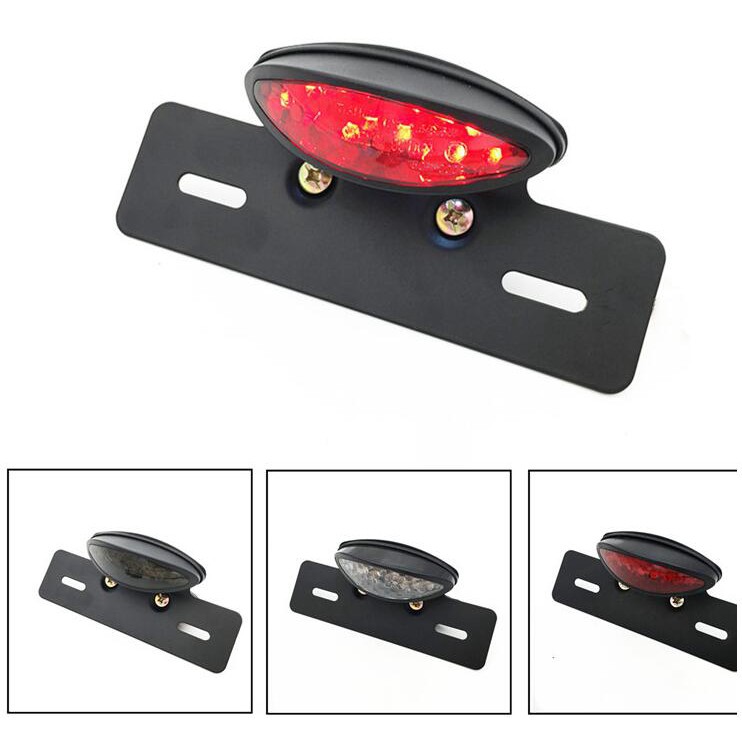 Universal รถจักรยานยนต์ LED ไฟท้ายหยุดไฟเบรคป้ายทะเบียนสําหรับ Harley Bobber Chopper Cafe Racer