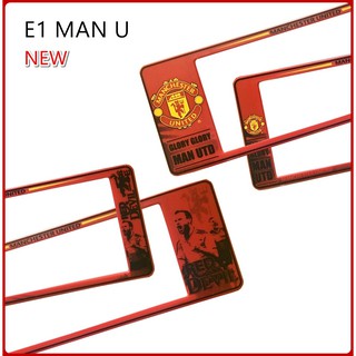 กรอบป้ายทะเบียนรถยนต์ กันน้ำ ลาย E1 MAN-U ทีมแมนยู 1 คู่ สั้น-ยาว ชิ้นสั้น 39.5x16cm ชิ้นยาว 48x16 cm. พอดีป้ายทะเบียน