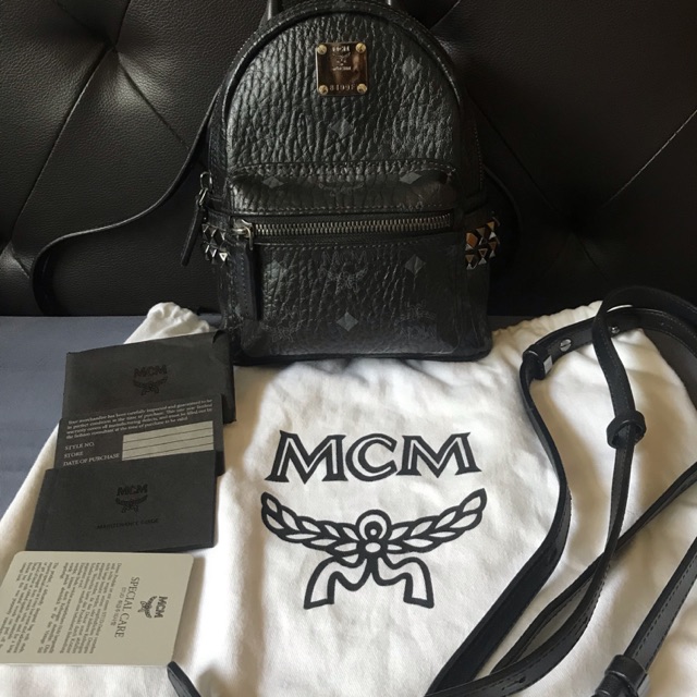 Mcm x mini สีดำ กระเป๋าเป้ สะพายได้ใบเล็ก