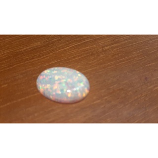 Opal lab -White Oval shape 23x18. Wt 10cts