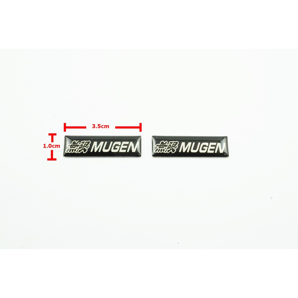 ป้ายโลโก้ เลซิ่น MUGEN ดำ/แดง ขนาด 3.5.X1.0 cm ติดตั้งด้วยเทปกาวสองหน้าด้านหลัง