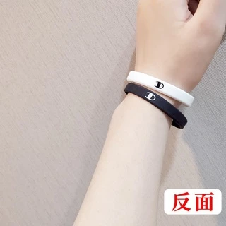 Champion สร้อยข้อมือยาง สร้อยข้อมือคู่ กำไลข้อมือซิลิโคน สไตล์กีฬา สีดำและสีขาว ลายตัวอักษร สำหรับผู้ชายและผู้หญิง
