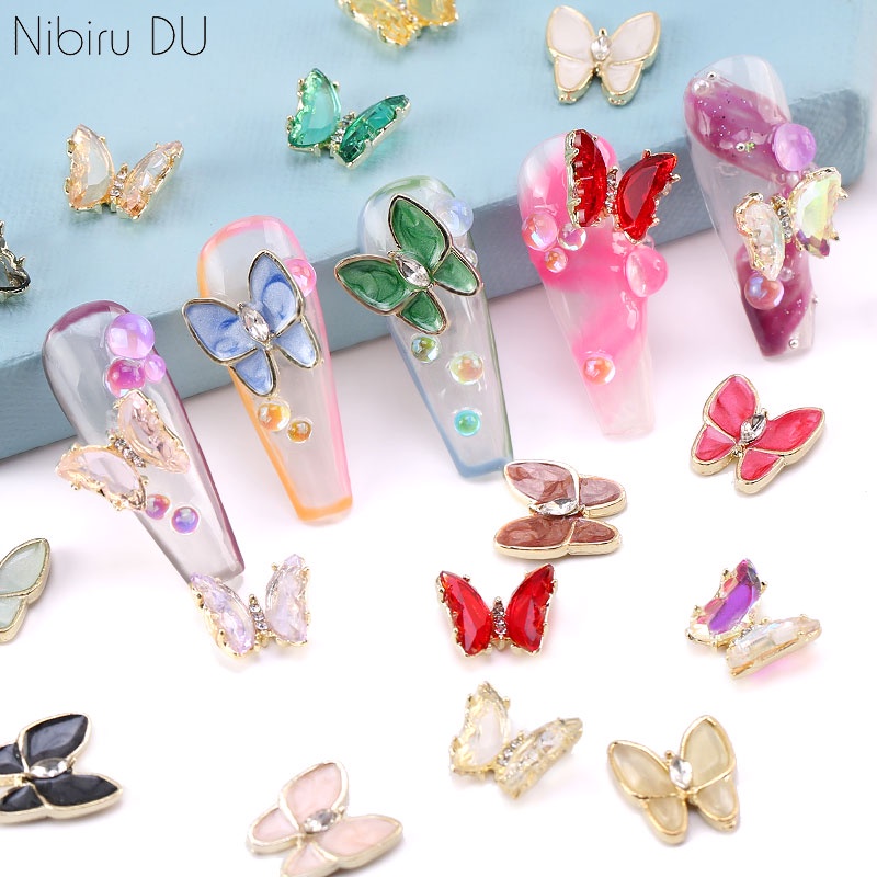 จี้คริสตัล พลอยเทียม รูปผีเสื้อ 3D หลายสี สําหรับตกแต่งเล็บ DIY 10 ชิ้น ต่อแพ็ก