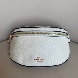 Size:7.75″ L x 4.25″ H x 2.5″ W. Has an outside zipper pocket on the bag in addition to the main compartment. Coach39939