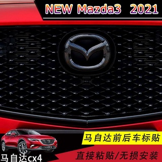 【 New Mazda3 2021 】เหมาะสำหรับ Mazda cx-4 ดัดแปลงโลโก้รถด้านหน้าและด้านหลัง Angksela คาร์บอนไฟเบอร์รูปแบบสีดำสดใสด้านหน้