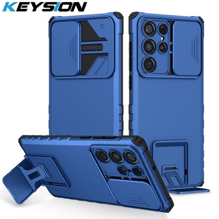 Keysion เคสโทรศัพท์มือถือ กันกระแทก กันรอยกล้อง พร้อมขาตั้ง สําหรับ Samsung S22 Ultra 5G S22+ S21 Plus Galaxy S21 FE 5G