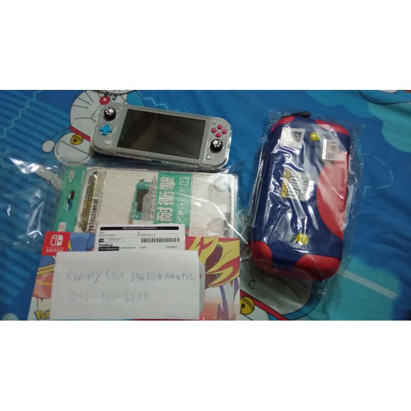nintendo switch lite pokemon + เคสใส +กระเป๋า (มือสอง)
