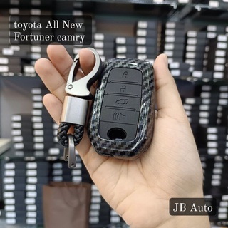 เคสกุญแจรถยนต์ เคสเคฟล่าปุ่มซิลิโคน งานเงา สำหรับ toyota fortuner camry (พร้อมพวงกุญแจ)