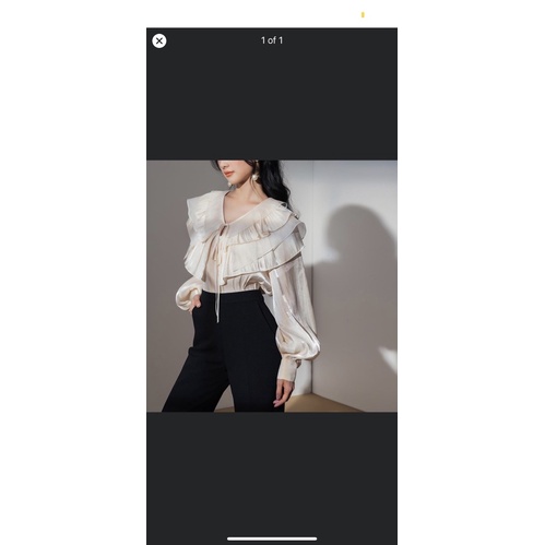Minh Trang เสื้อเชิ้ตผ้าไหมสีเบจ Elpis