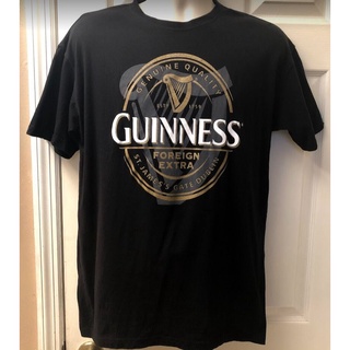 เสื้อยืดอินเทรนด์ผู้ชายอินเทรนด์ผู้หญิงเสื้อยืด พิมพ์ลายกราฟฟิค Guinness Official Merchandise ขนาดใหญ่ สวมใส่สบาย สําหรั