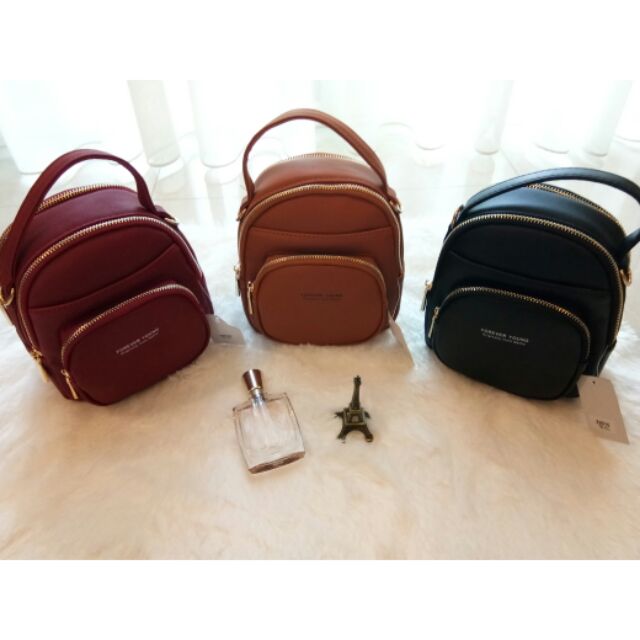 กระเป๋าถือหรือสะพายข้างForever Young โคตรสวย หนังดีมาก หรูหรามีระดับ ของแท้แน่นอน