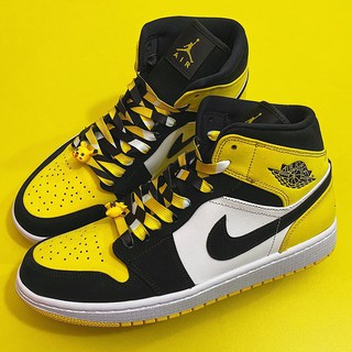 black and yellow air jordan 1s