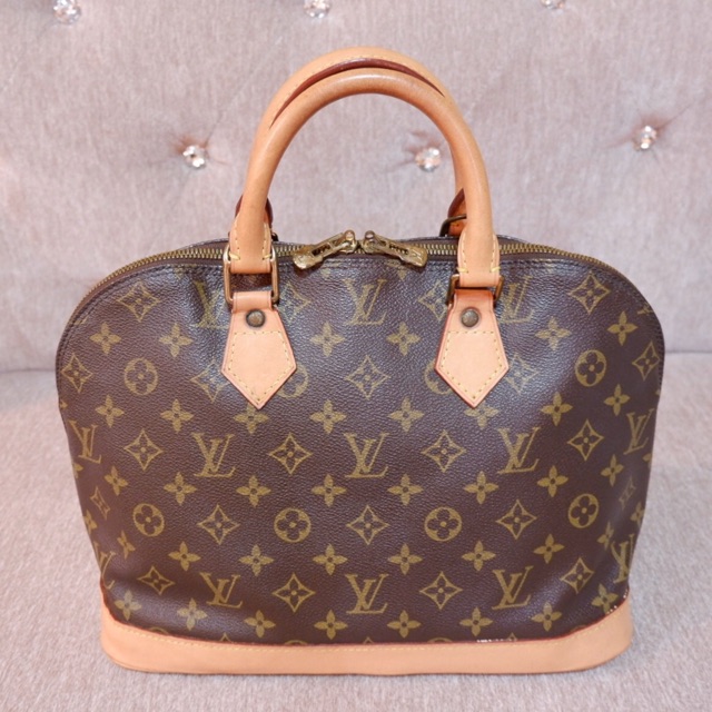 louis vuitton alma used