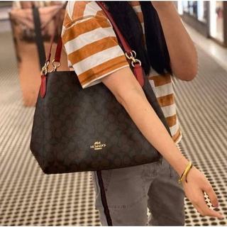 Coach HALLIE SHOULDER BAG IN SIGNATURE CANVAS