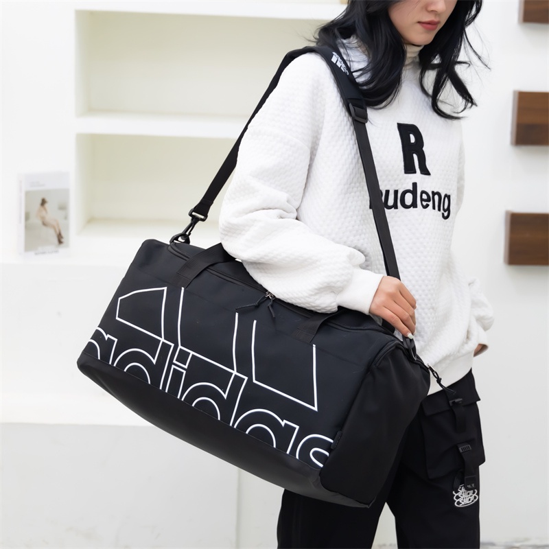Adidas ของแท้ 100% กระเป๋าเดินทาง น้ําหนักเบา แบบพกพา ความจุเยอะ อเนกประสงค์ สําหรับผู้ชาย และผู้หญิง เหมาะกับการเล่นกีฬา เข้ายิม