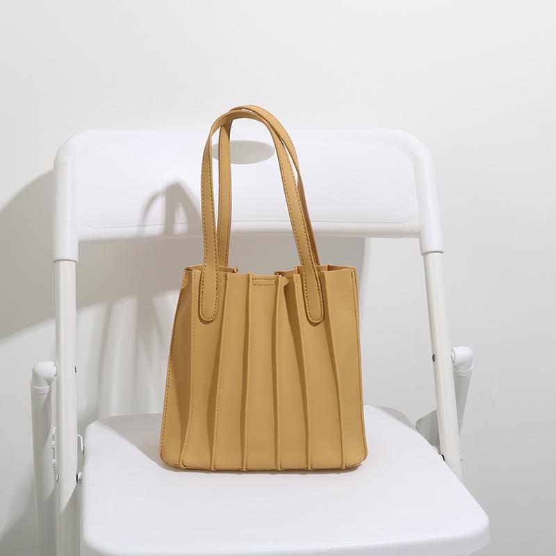 กระเป๋าถือ✔Niche design bag ins original Thai pleated bag summer pleated organ player single shoulder messenger bucket b