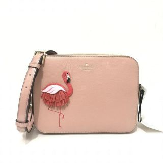 Kate Spade WKRU5953 Flamingo Pink Camera Bag by the pool
