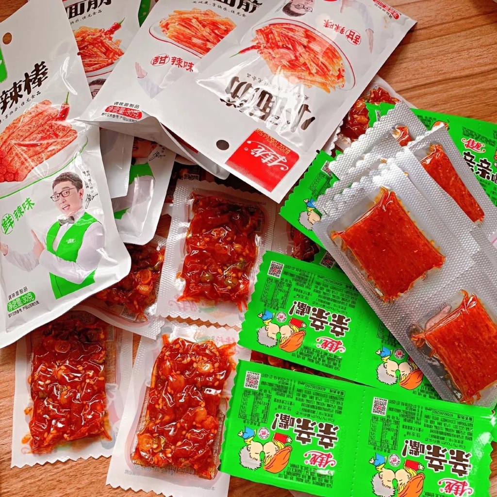 ข้อเสนอพิเศษ Jialong รสเผ็ดแถบเผ็ดของว่างสนุกสนานกลูเตนใหญ่จูบปากมีดเผา