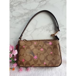 Nolita 19 in Signature Canvas with Disco Star Print Coach C7294