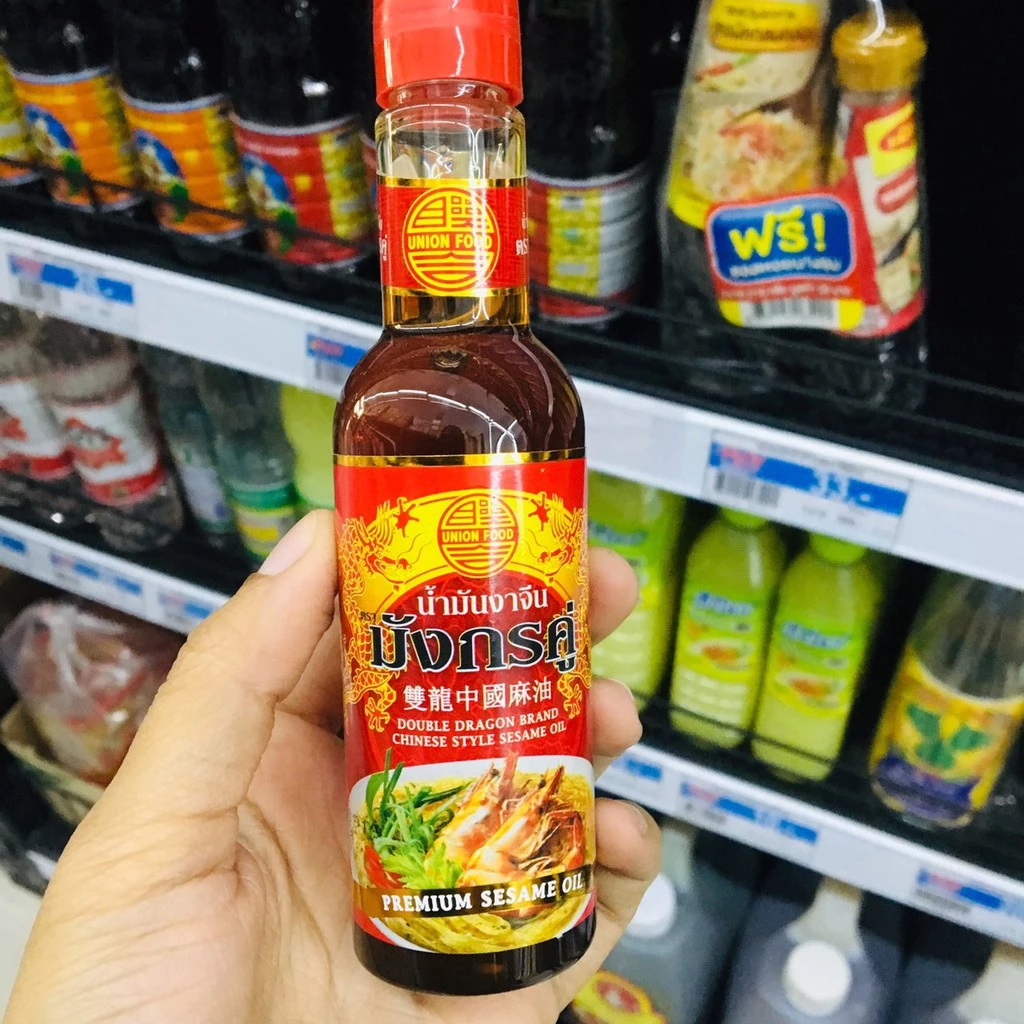 น้ำมันงา ตรามังกรคู่ ขนาด 100 มล. ( แพ็ค 2 ขวด )