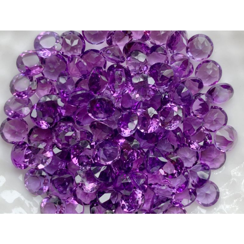 5.0mm. พลอยอเมทิสกลมเจียรเหลี่ยม ราคากะรัตละ 70฿