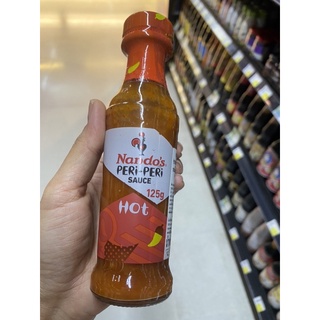 ซอสหมักไก่ย่าง และจิ้มอาหาร รสเผ็ดเปรี้ยว ตรา นานโด้ส์ 125 G. Hot Peri - Peri Sauce ( Nando’s Brand )