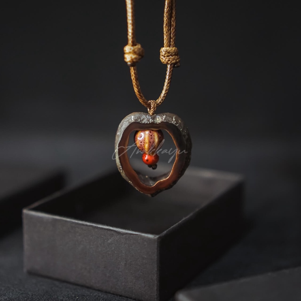 สร้อยคอ Pecan แบบยืดหยุ่น ต่างกัน