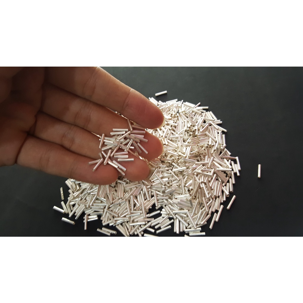 ดอกตะกรุดเงินแท้ 99.99% ขนาด 1cm x 1 cm ม้วนสำเร็จ (10 ดอก)