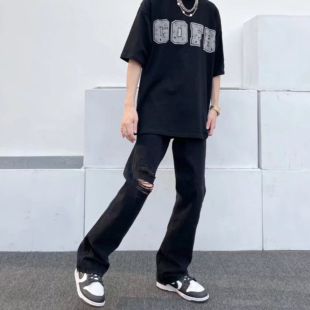 กางเกงยีนส์ Micro Flared Ripped สีดําผู้ชายตรงหลวมกางเกงสไตล์ Retro VIBE