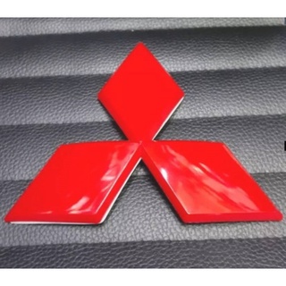 ครอบโลโก้หน้า MITSUBISHI หน้าปาเจโร่ สปอตร์ และหน้าไทรทัน ทุกรุ่น สีแดง