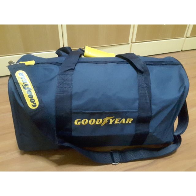 กระเป๋าเดินทางพรีเมี่ยม Goodyear สีกรม ปักสีเหลือง มีสายสะพายไหล่ ขนาด 18.5 × 9  สูง 10 นิ้ว