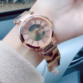 (ผ่อน0%)นาฬิกา GUESS Ladies Rose Watch With Tortoiseshell Trim and Bangle Bracelet W0638L8 เรซิ่นลายหินอ่อน 39 mm.