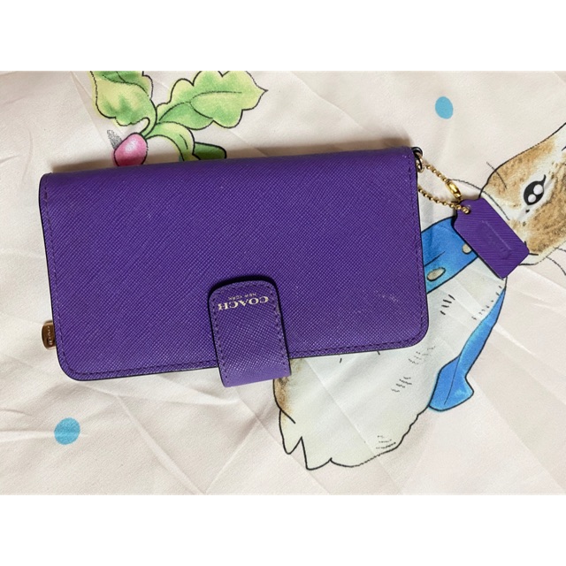 กระเป๋าใส่โทรศัพท์ Coach