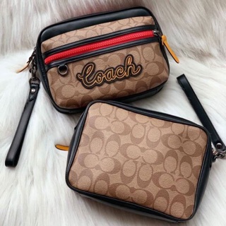 ใส่ของได้เยอะจ้า สวยเท่ห์TERRAIN POUCH IN SIGNATURE CANVAS (COACH F73254) TAN/BLACK ANTIQUE NICKEL